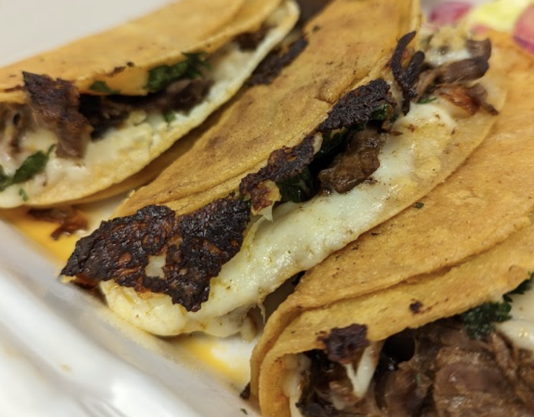 Tacos Mariana's signature dishes Steak TacosPupusasChicken Tacos